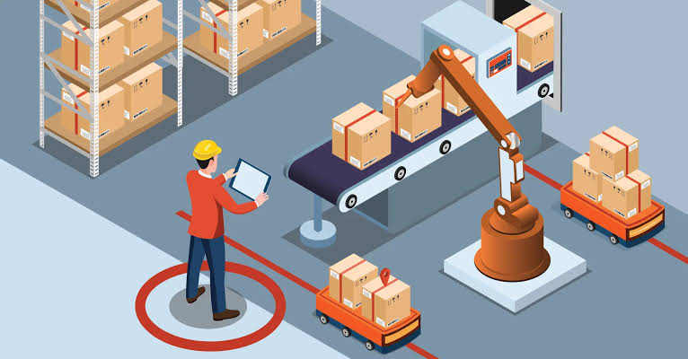 Automated carton packing line at a packaging manufacturer